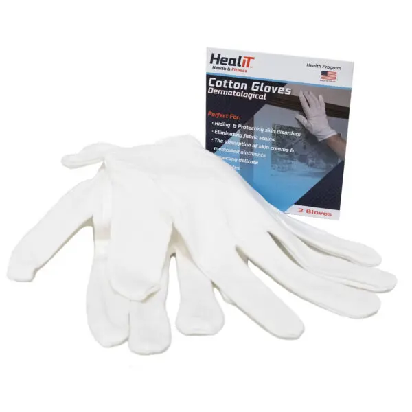 A pair of white cotton gloves is displayed in front of a HealIT Cotton Gloves Dermatological package, ideal for use under a compression wrap.
