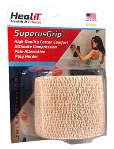 A package of HealIT SuperusGrip beige cotton compression wrap, featuring product details and an image of a woman wearing the compression wrap while climbing on a rock wall.