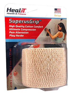 A package of HealIT SuperusGrip beige cotton compression wrap, featuring product details and an image of a woman wearing the compression wrap while climbing on a rock wall.