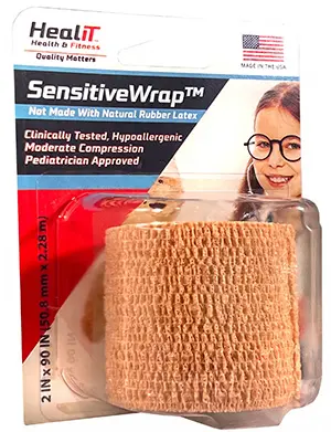 HealIT SensitiveWrap elastic compression wrap in retail packaging, featuring product details and a smiling child. The tan wrap is latex-free, hypoallergenic, pediatrician approved, and perfect for gentle support.