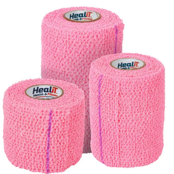 Three rolls of Pink ShieldGrip™ Compression Wrap with HealIt Health & Fitness labels shown on a plain background. Ideal as a self-adhesive wrap, providing reliable support and comfort.