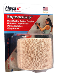 A package of HealIT SuperusGrip beige cotton compression wrap, featuring product details and an image of a woman wearing the compression wrap while climbing on a rock wall.