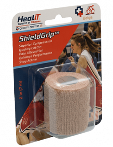 A packaged roll of beige compression wrap bandage labeled ShieldGrip for pain relief and support, displayed in retail packaging.