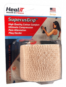 A package of HealIT SuperusGrip beige cotton compression wrap, featuring product details and an image of a woman wearing the compression wrap while climbing on a rock wall.
